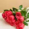 بوكيه ورد أحمر فاتح طبيعي - 12 وردة رومانسية من ورد روزا